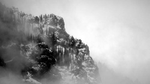 Clouds frolicking in the cliffs